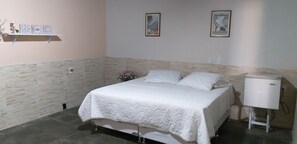 Suite Familia II - Vista para Jardim - Deck com mesa | Ropa de cama de alta calidad, minibar, wifi gratis y ropa de cama