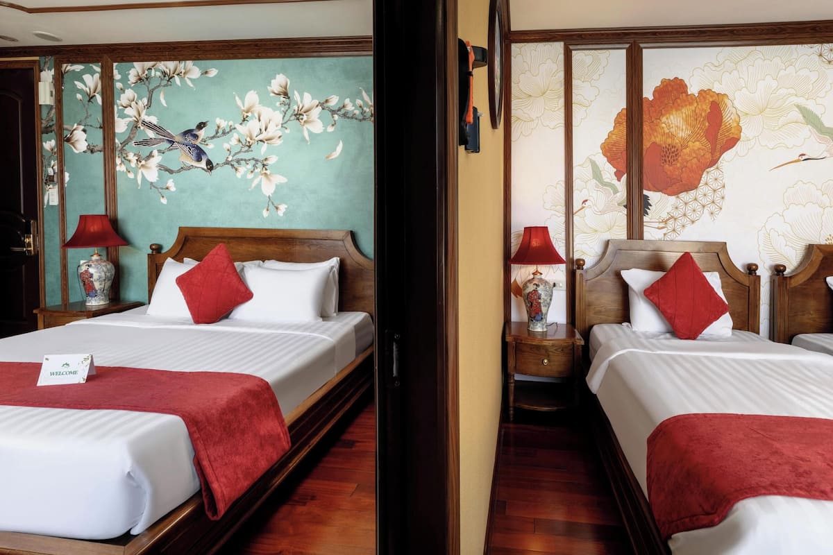 Habitación cuádruple familiar, 2 habitaciones, habitaciones conectadas, vista a la bahía | Ropa de cama de alta calidad y minibar