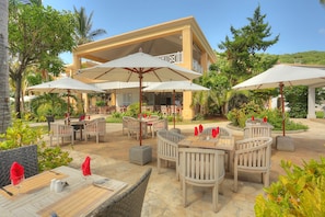 Breakfast, lunch served; local and international cuisine, pool views