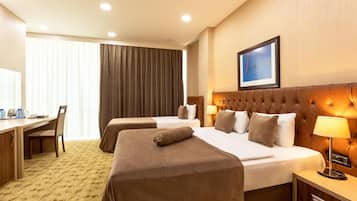 Deluxe Triple Room | 1 bedroom, premium bedding, minibar, in-room safe