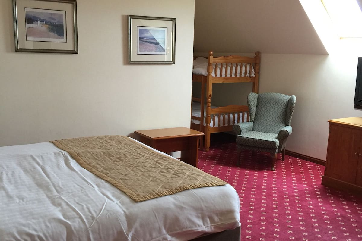 Family Room (2 Adults + 2 Children) | Blackout drapes, iron/ironing board (on request), WiFi (free)