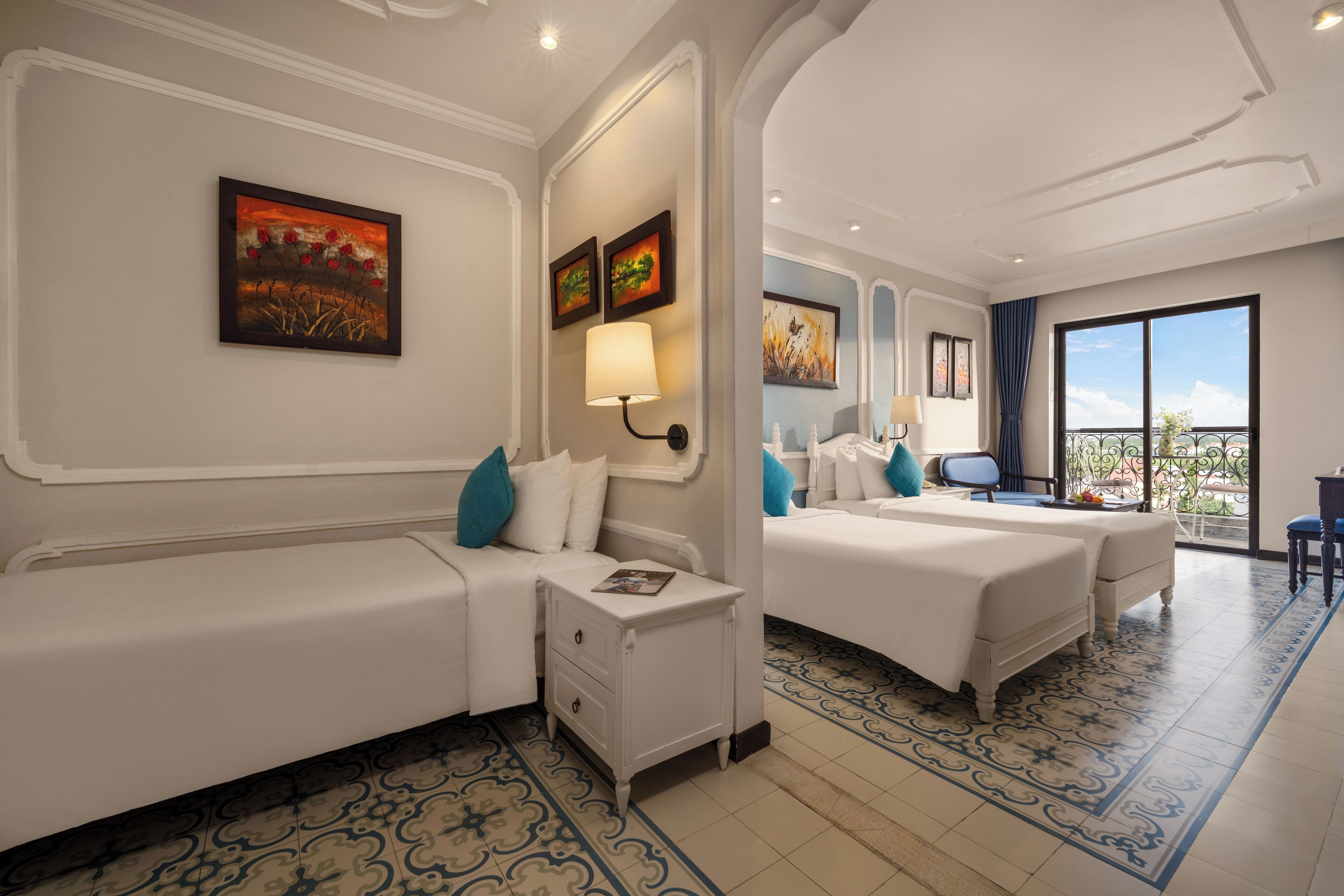 family triple room, multiple beds, bathtub, city view | living area | 42-inch smart tv with cable channels, tv