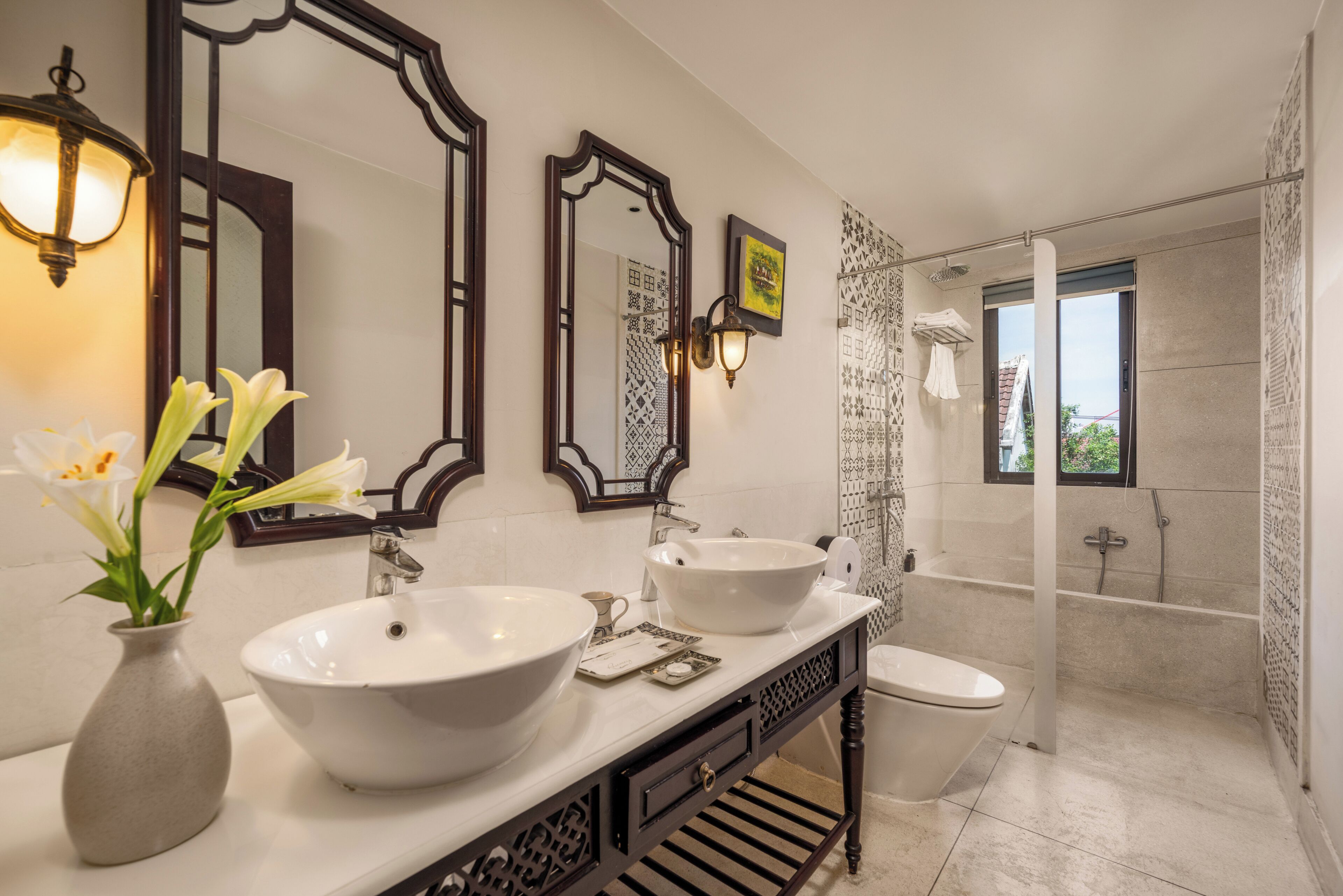 family quadruple room, multiple beds, bathtub, city view | bathroom | combined shower/bathtub, rainfall showerhead, designer toiletries