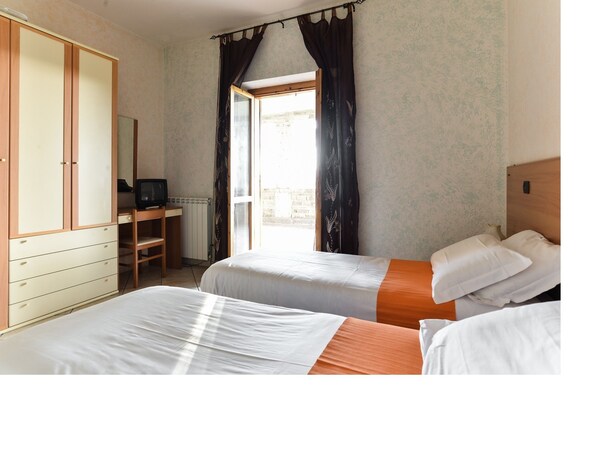 Desk, iron/ironing board, rollaway beds, free WiFi