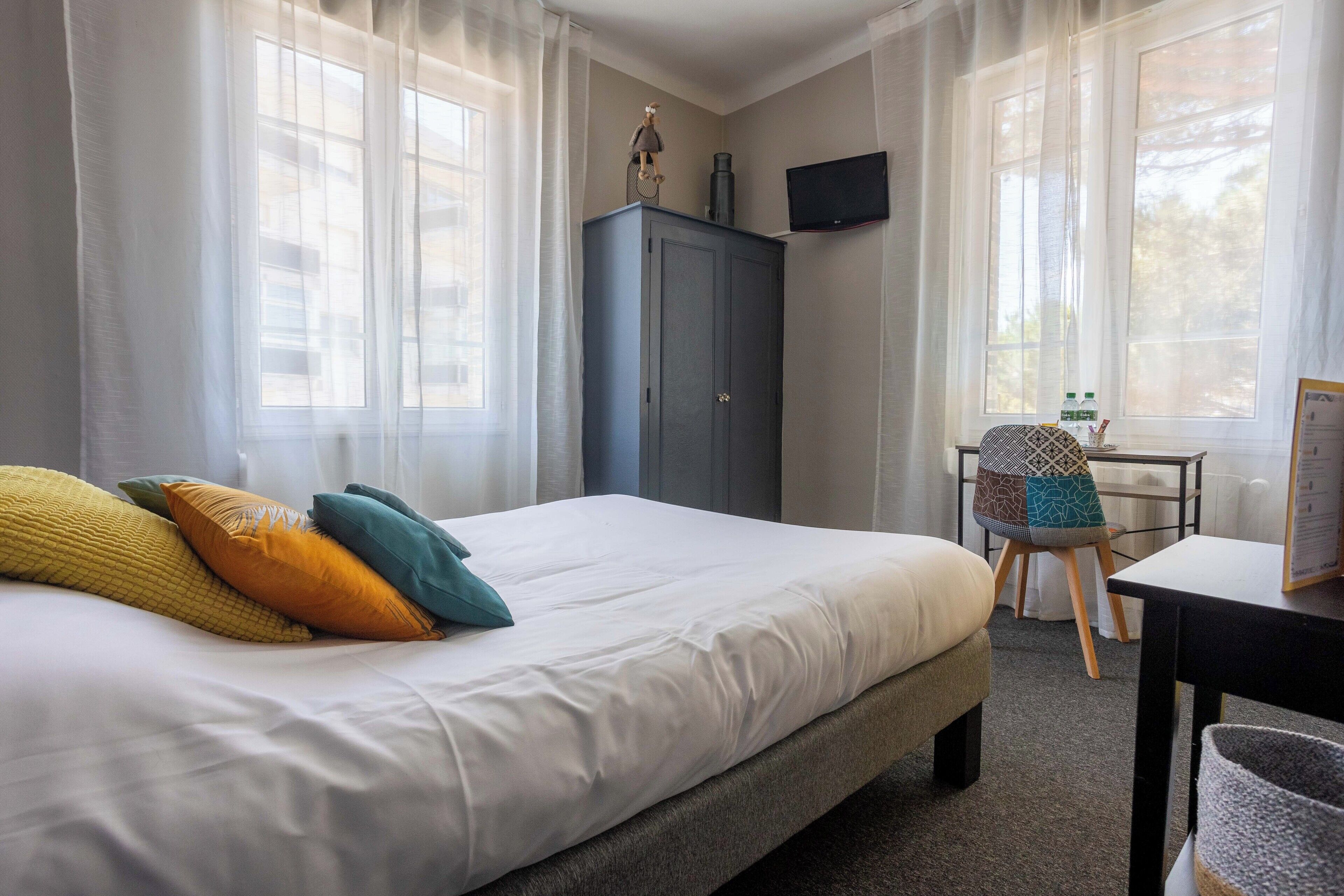 double room | individually decorated, individually furnished, desk, blackout curtains