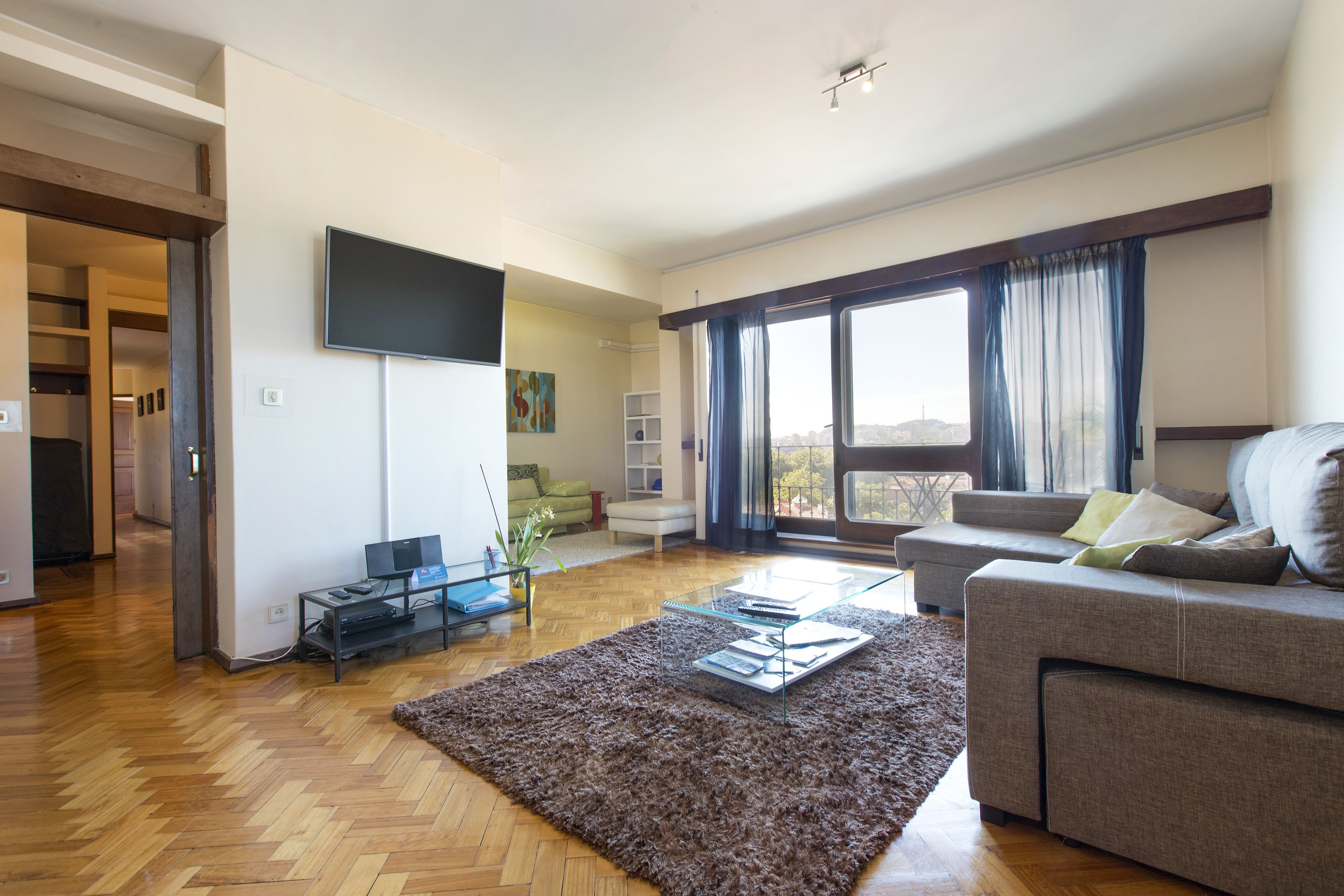 Departamento, 4 habitaciones | Sala de estar | Televisión de pantalla plana, chimenea y reproductor de DVD 