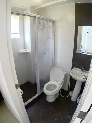 Shower, free toiletries, hair dryer, towels