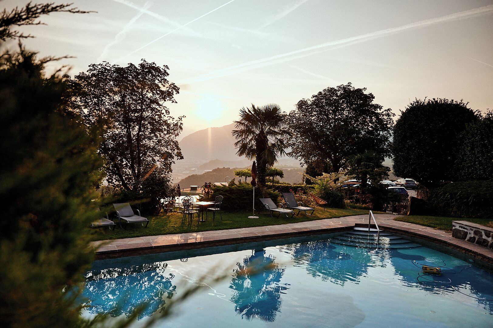 indoor pool, outdoor pool, pool umbrellas, pool loungers