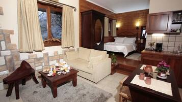 Suite, Fireplace, Mountain View | Living area | Flat-screen TV, fireplace