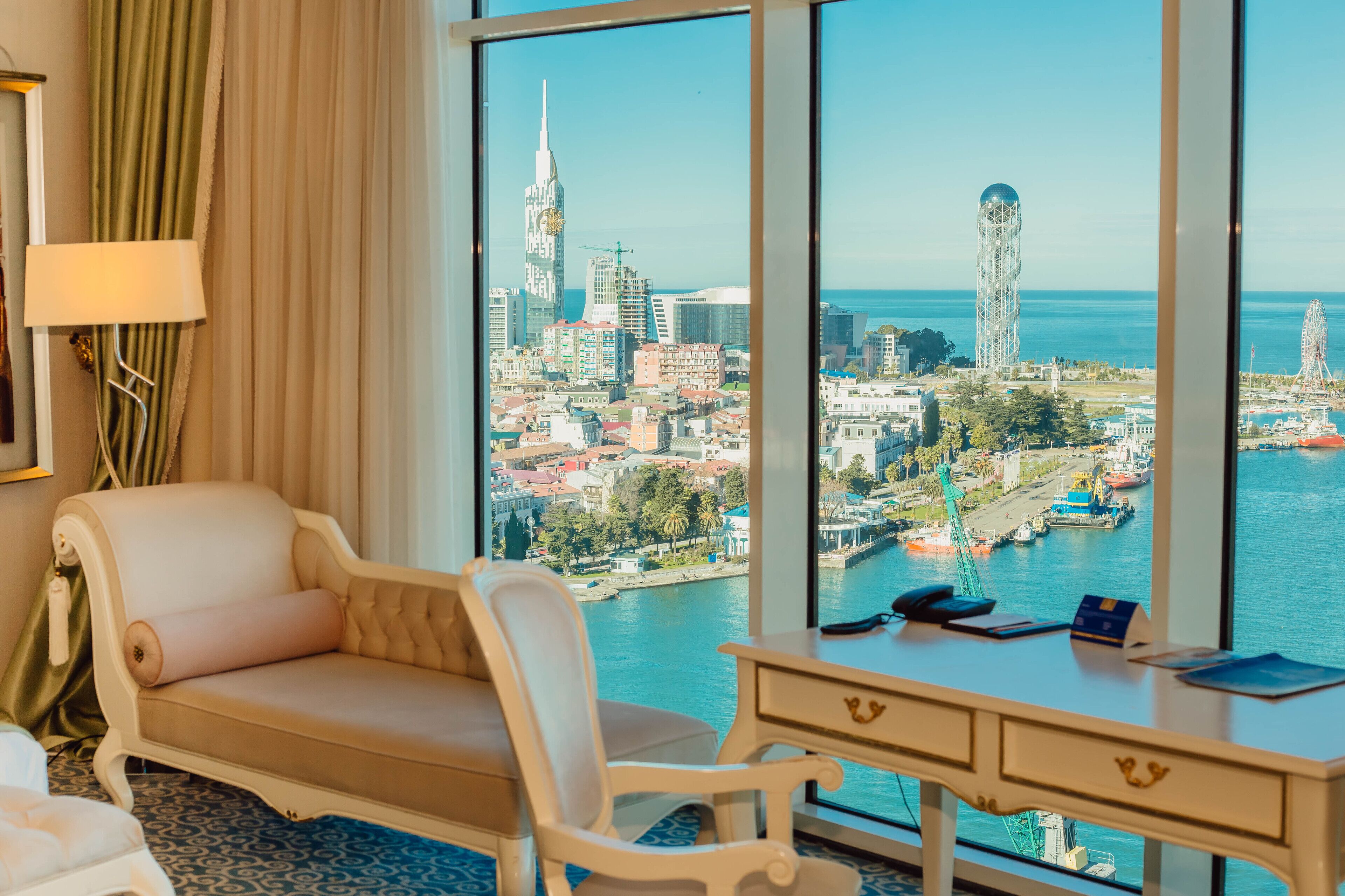 Executive Suite | Living area | 34-inch flat-screen TV with cable channels, TV