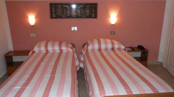 Triple Room, 1 Bedroom | 1 bedroom, minibar, in-room safe, desk