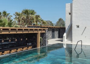 Seasonal outdoor pool, pool umbrellas, sun loungers - Istoria, A Member of Design Hotels (Santorini)