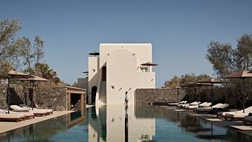 Seasonal outdoor pool, pool umbrellas, pool loungers