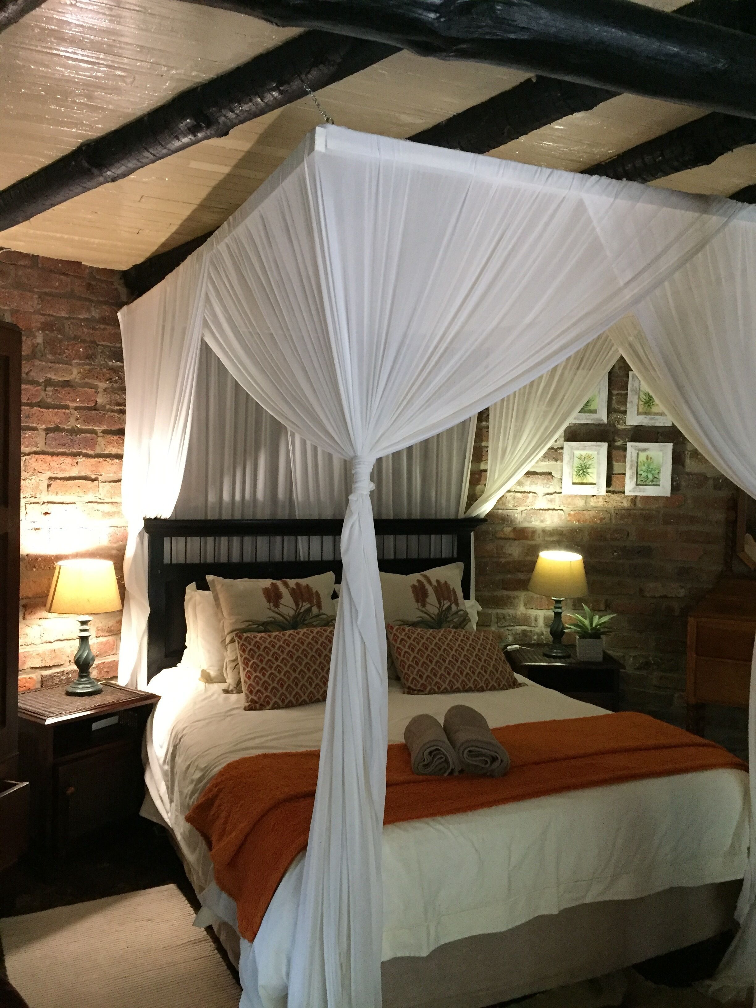 Traditional Bungalow | Desk, iron/ironing board, bed sheets