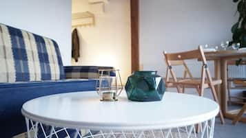 Loft panorâmico | Área de estar | TV de tela plana, Netflix