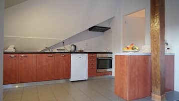 Loft panorâmico | Cozinha americana privada | Geladeira, micro-ondas, fogão, cooktop