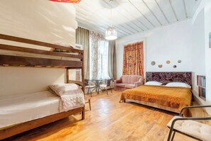 Family Room, 1 Bedroom | Iron/ironing board, free WiFi, bed sheets