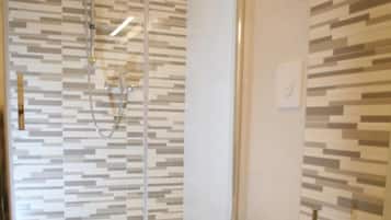 Shower, free toiletries, hair dryer, towels
