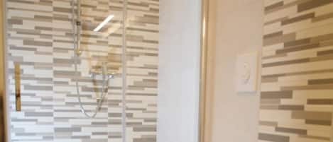 Shower, free toiletries, hair dryer, towels