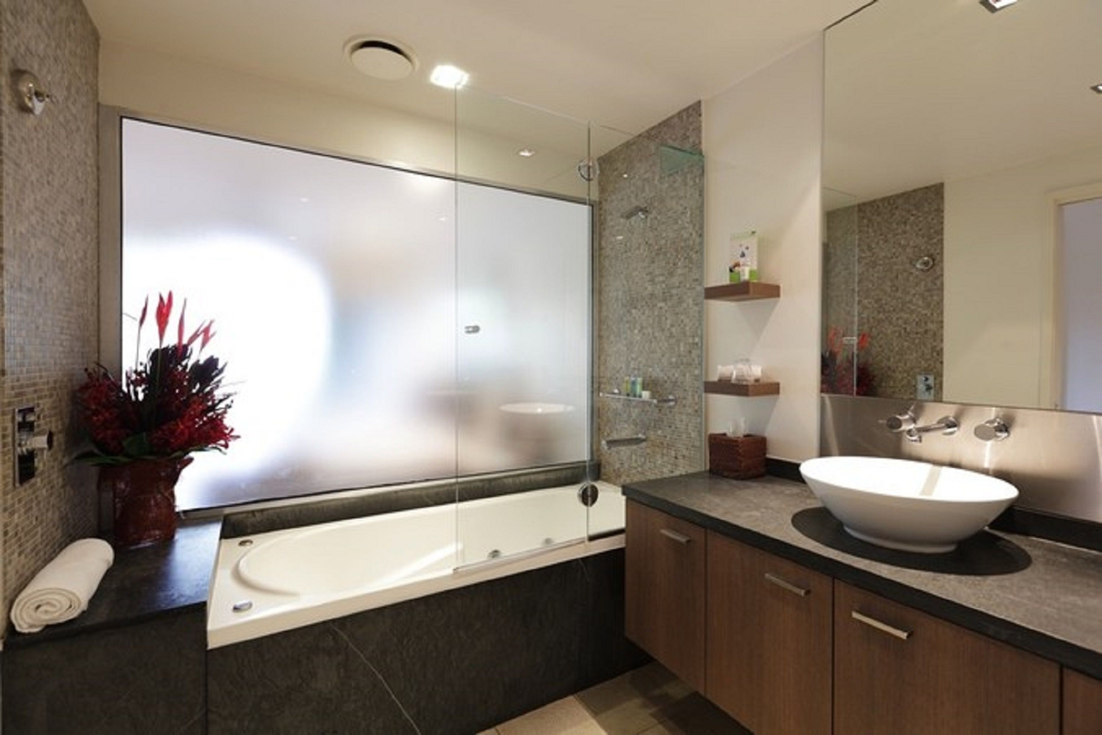 luxury apartment, 2 bedrooms, balcony, pool view | bathroom | combined shower/bathtub, deep-soaking bathtub, free toiletries