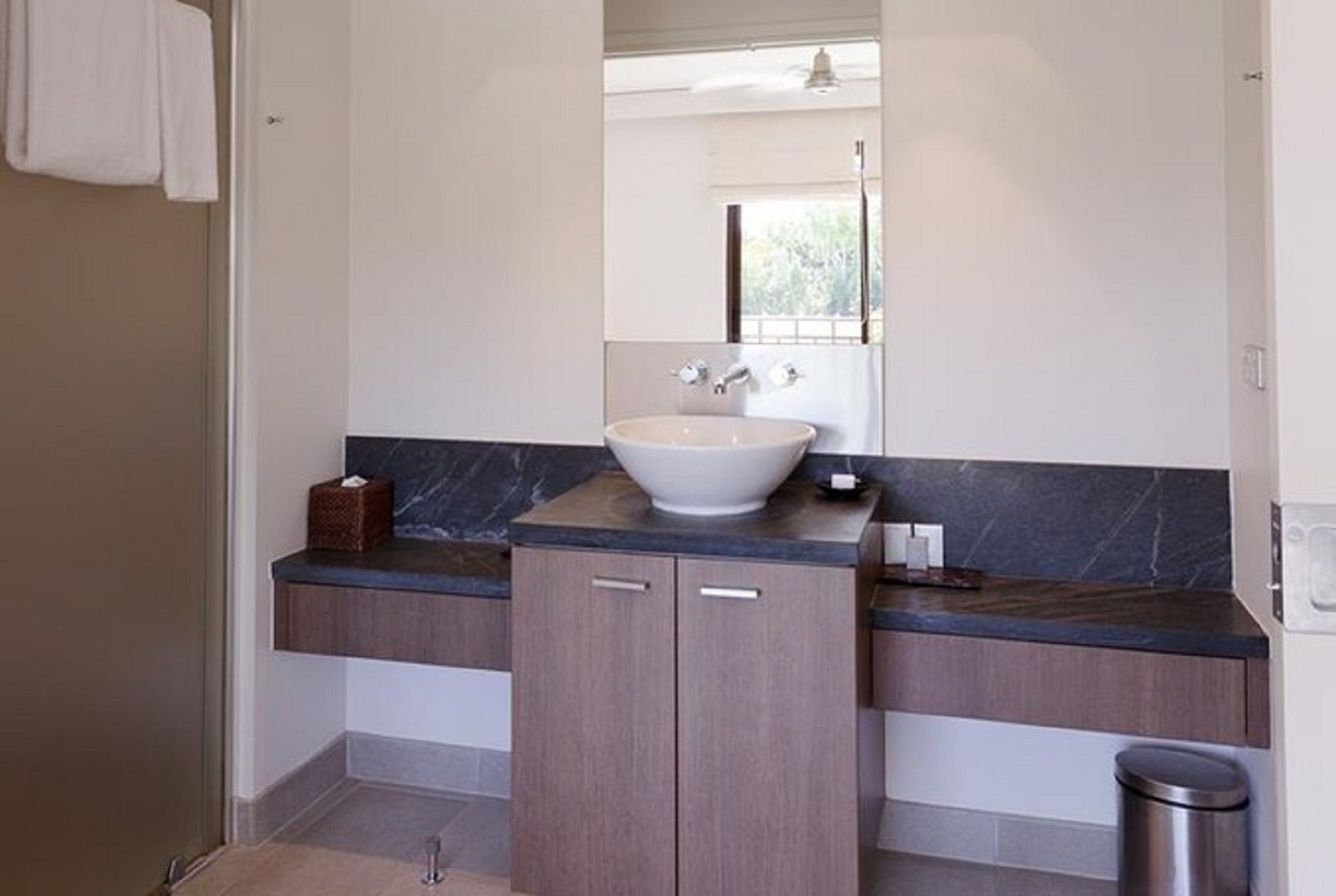 luxury apartment, 2 bedrooms, balcony, pool view | bathroom | combined shower/bathtub, deep-soaking bathtub, free toiletries