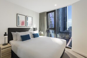 Premium bedding, desk, blackout curtains, soundproofing