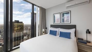 Premium bedding, desk, blackout drapes, soundproofing