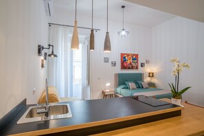 Chambre Quadruple | Coin cuisine privé