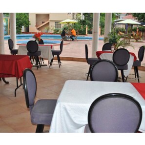 Breakfast, lunch, dinner served; local cuisine 