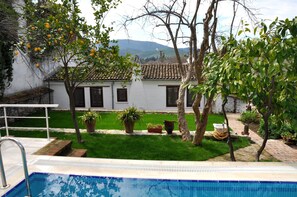 Outdoor pool, pool umbrellas, pool loungers