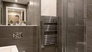 Shower, free toiletries, hair dryer, towels