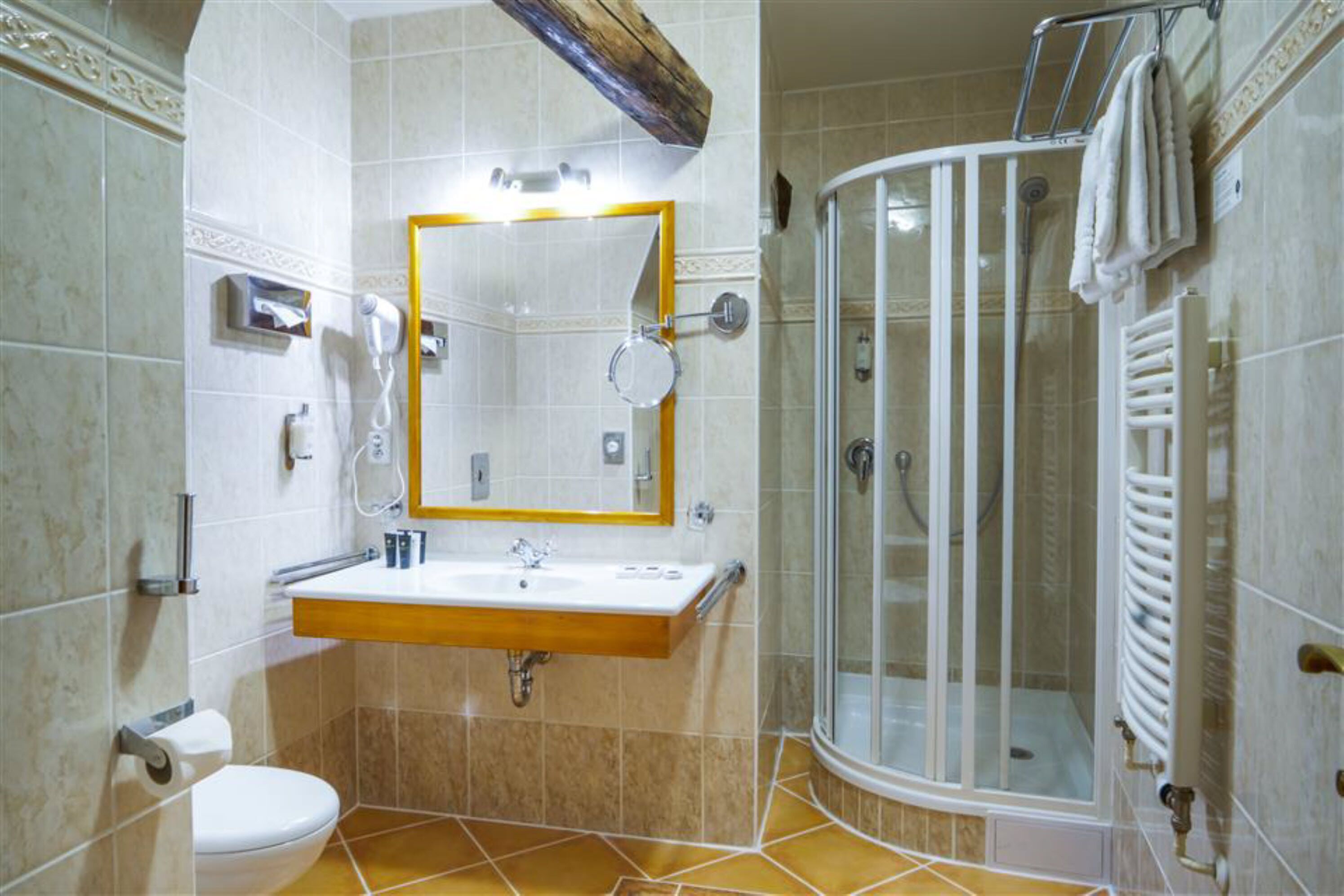 free toiletries, hair dryer, slippers, towels