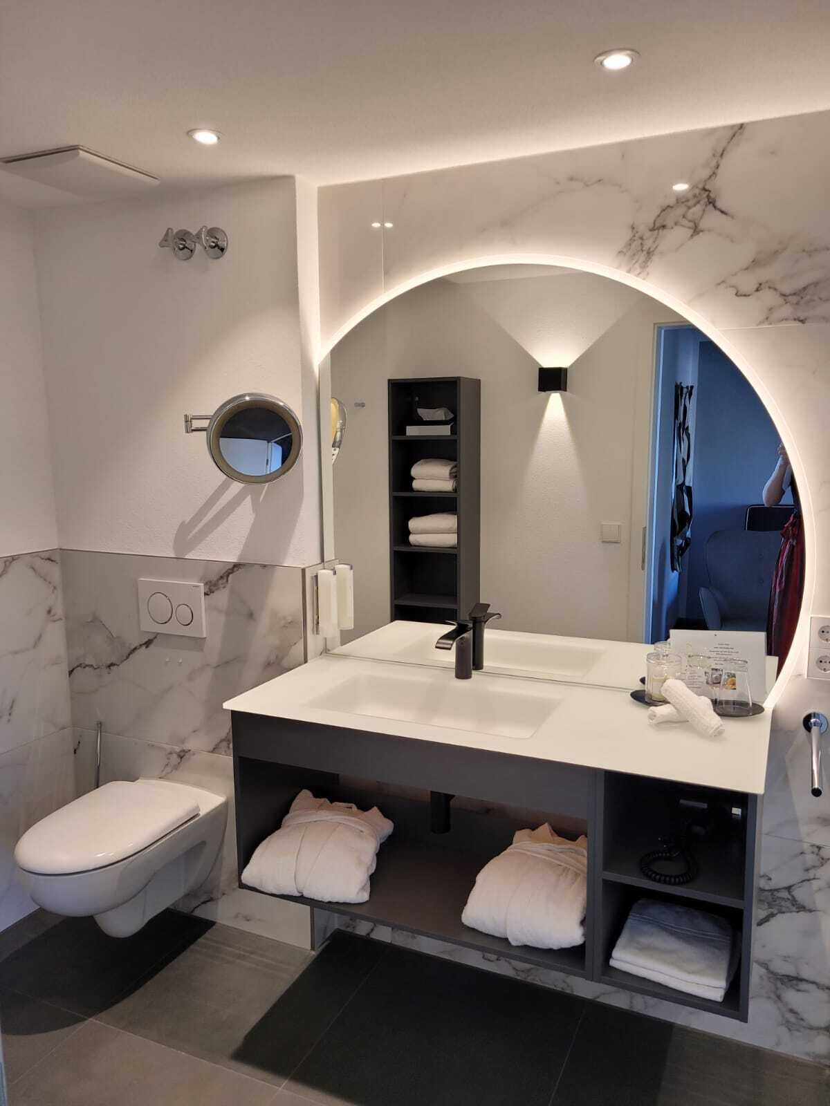 shower, hair dryer, bathrobes, towels