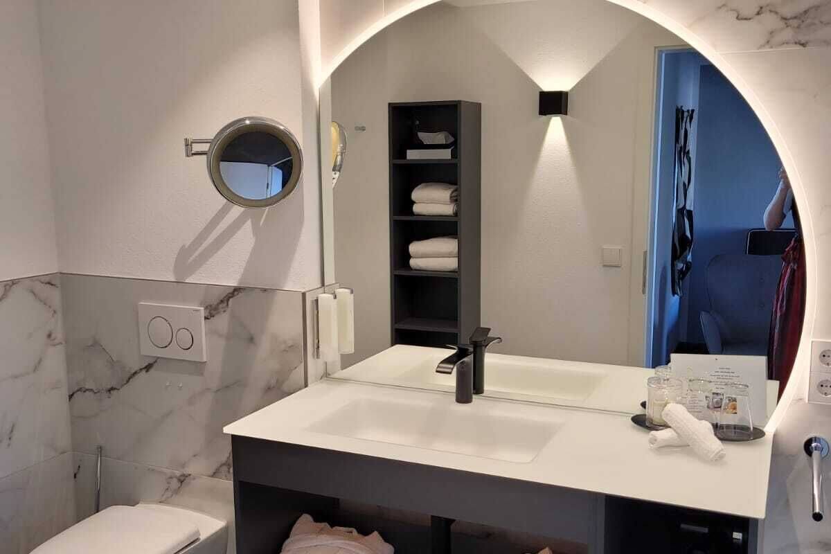 shower, hair dryer, bathrobes, towels