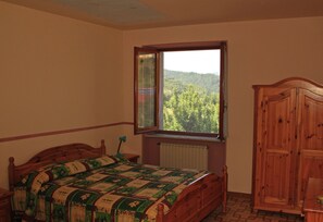 Habitación cuádruple | Ropa de cama