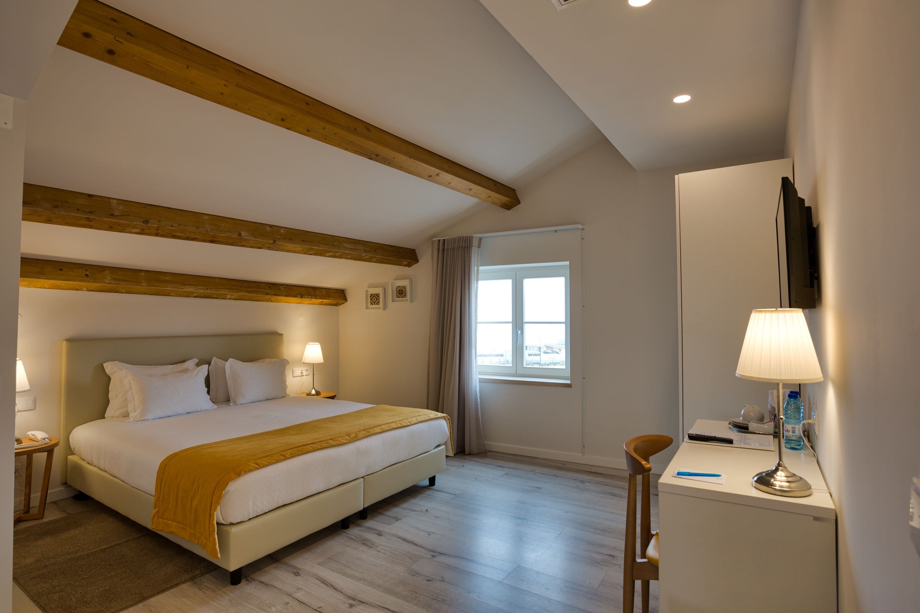 superior double or twin room | minibar, in-room safe, desk, laptop workspace