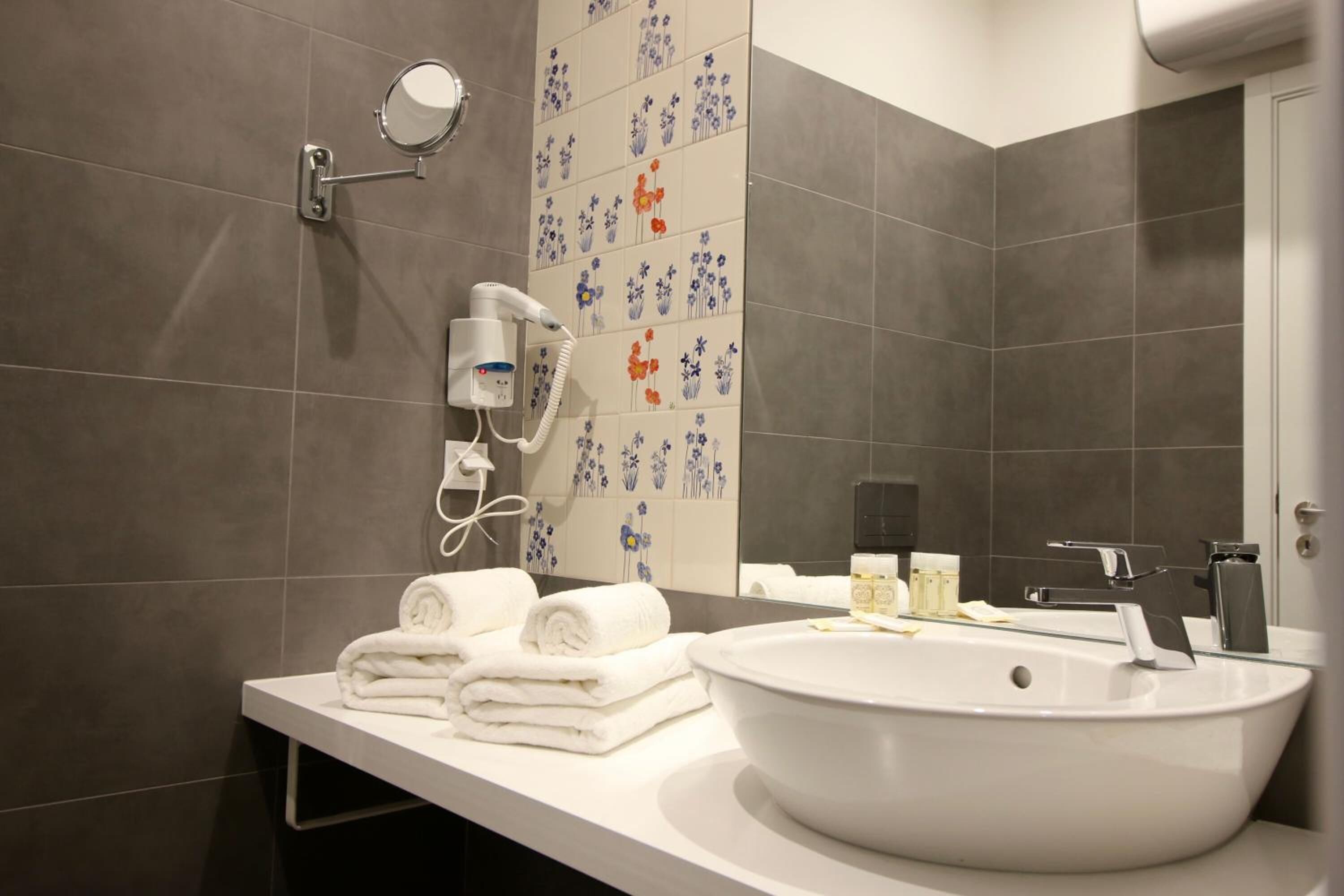 superior double or twin room | bathroom | shower, free toiletries, hair dryer, towels