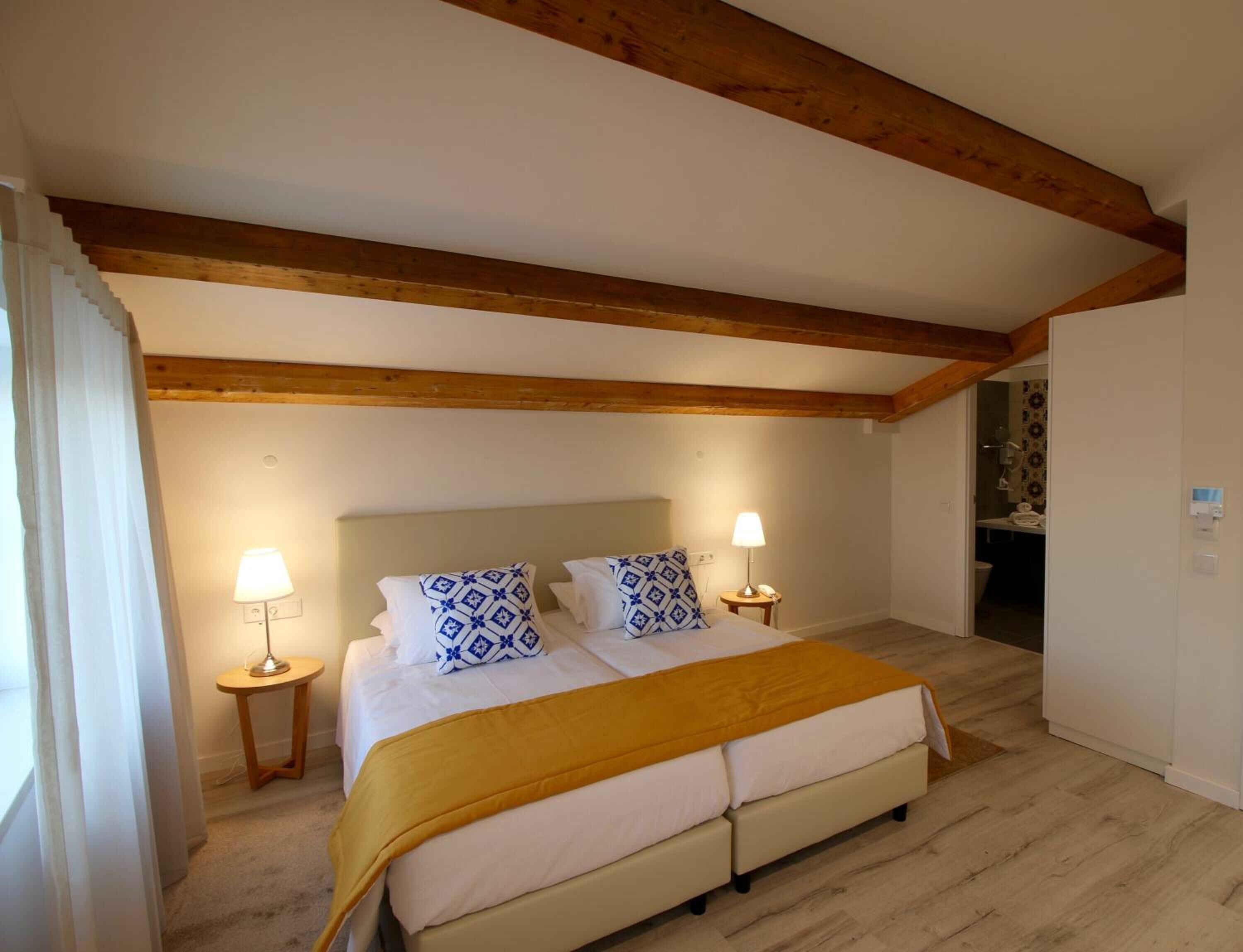 superior double or twin room | minibar, in-room safe, desk, laptop workspace