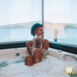 Chambre Double Deluxe pour 1 personne, bain à remous, vue lac | Salle de bain