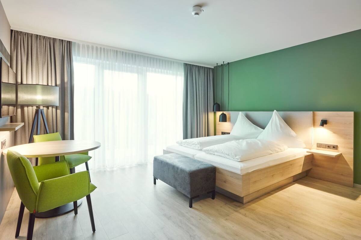 Dreibettzimmer mit Balkon