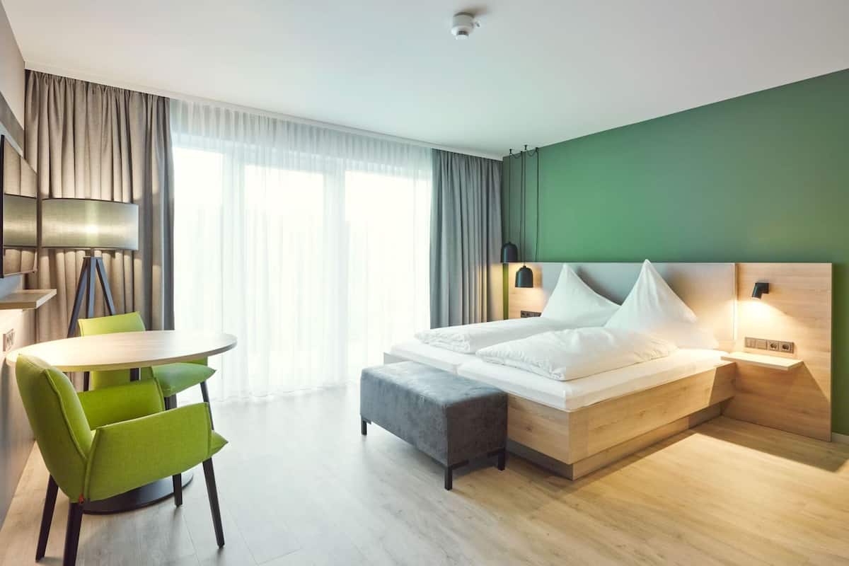 Dreibettzimmer mit Balkon