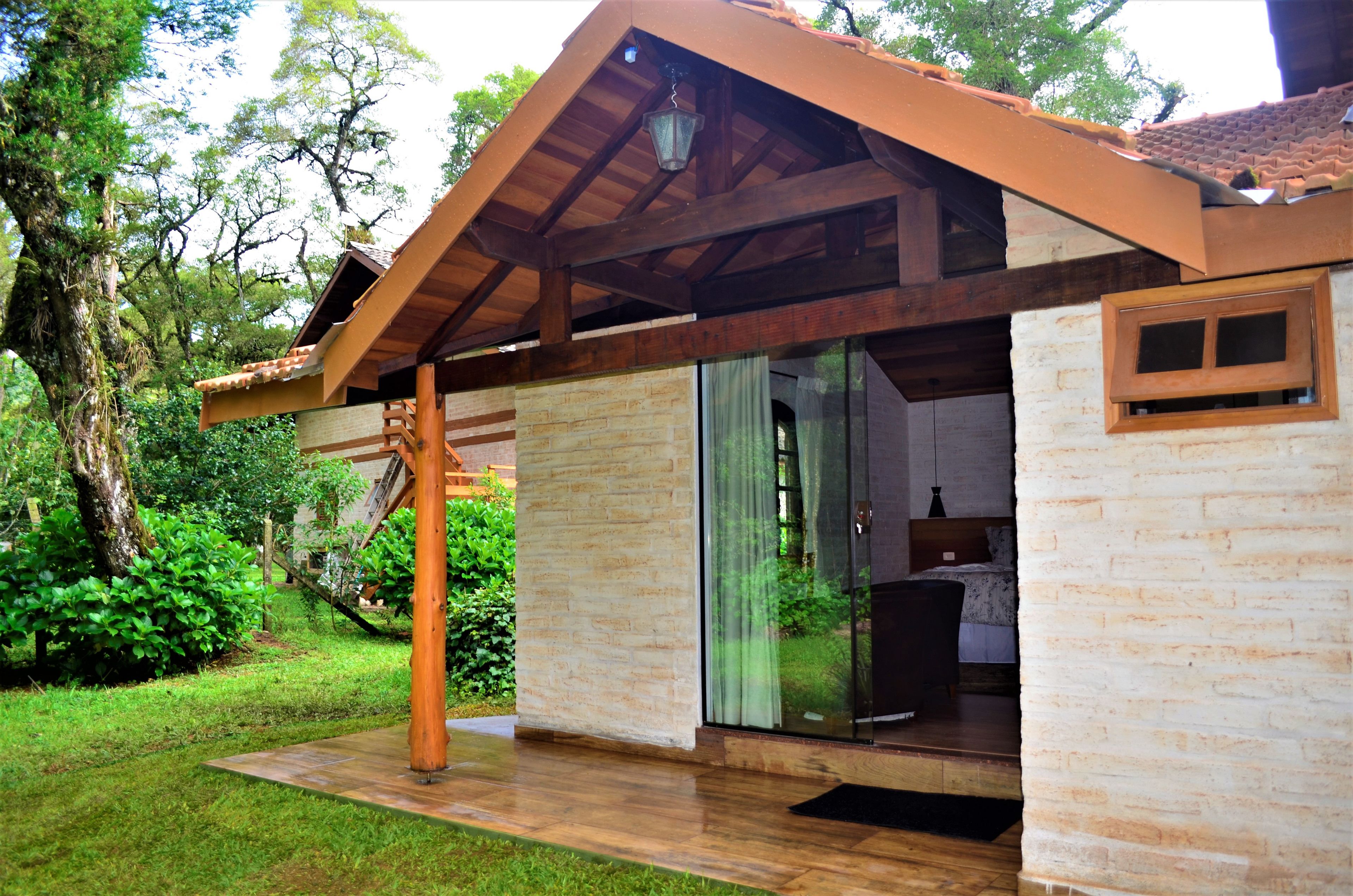 Design suite, 1 kingsize bed, bubbelbad, aan tuin | Uitzicht vanuit de kamer