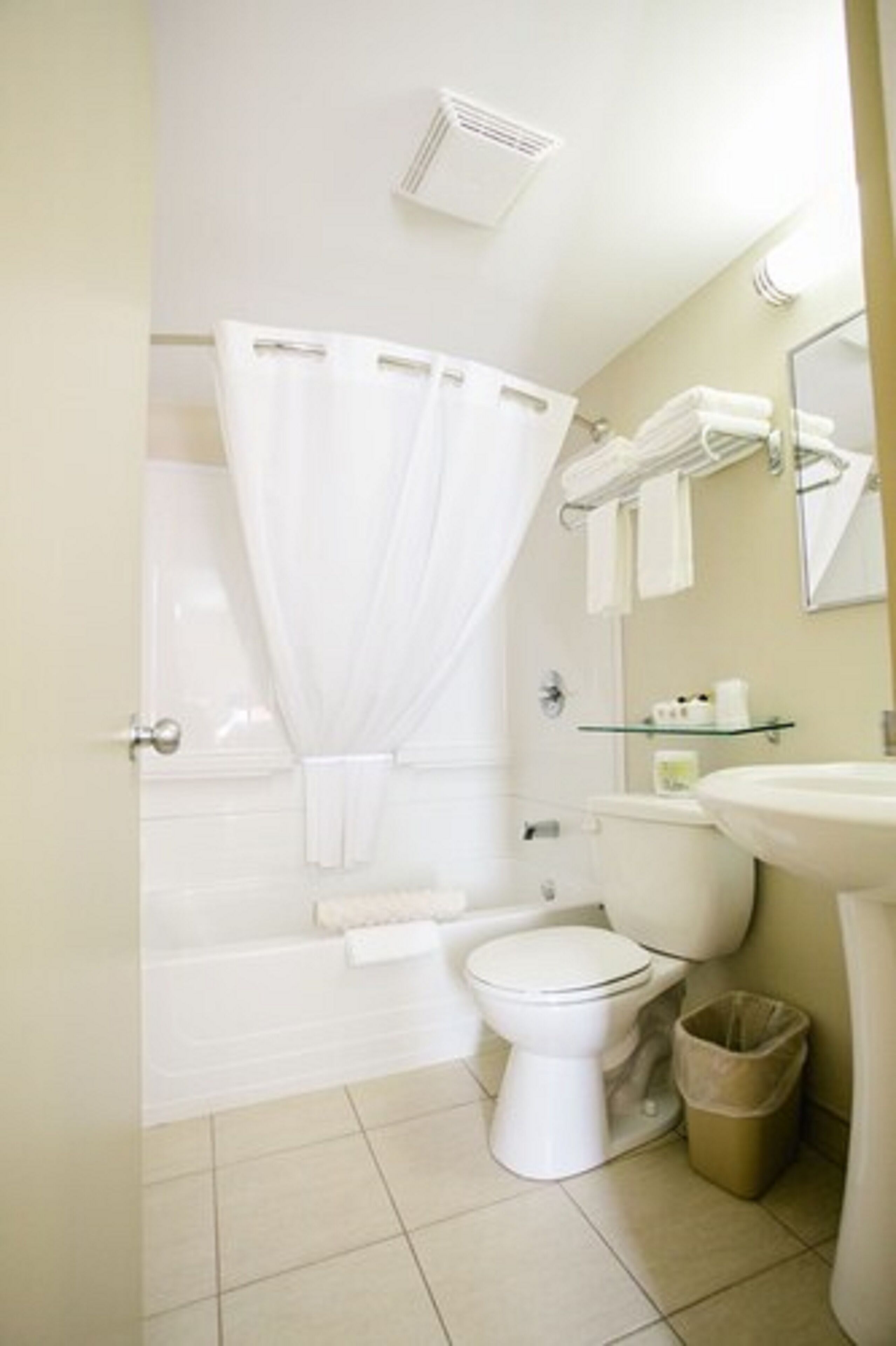 double room, 2 queen beds | bathroom | combined shower/bathtub, hair dryer, towels