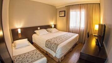 Ropa de cama de alta calidad, minibar y escritorio