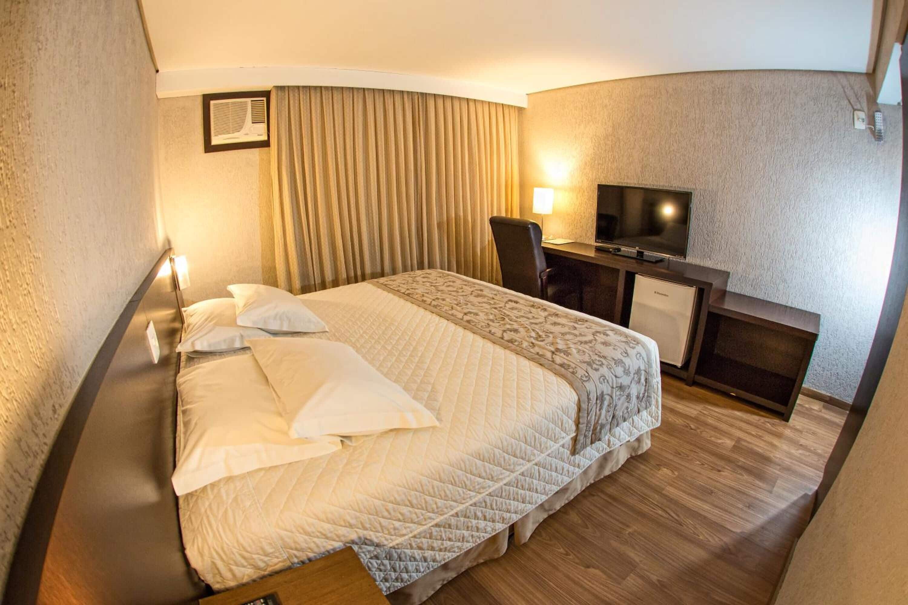 premium bedding, minibar, desk, laptop workspace