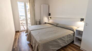 Kamer, 1 twee- of 2 eenpersoonsbedden, uitzicht op zee | Gratis wifi, beddengoed