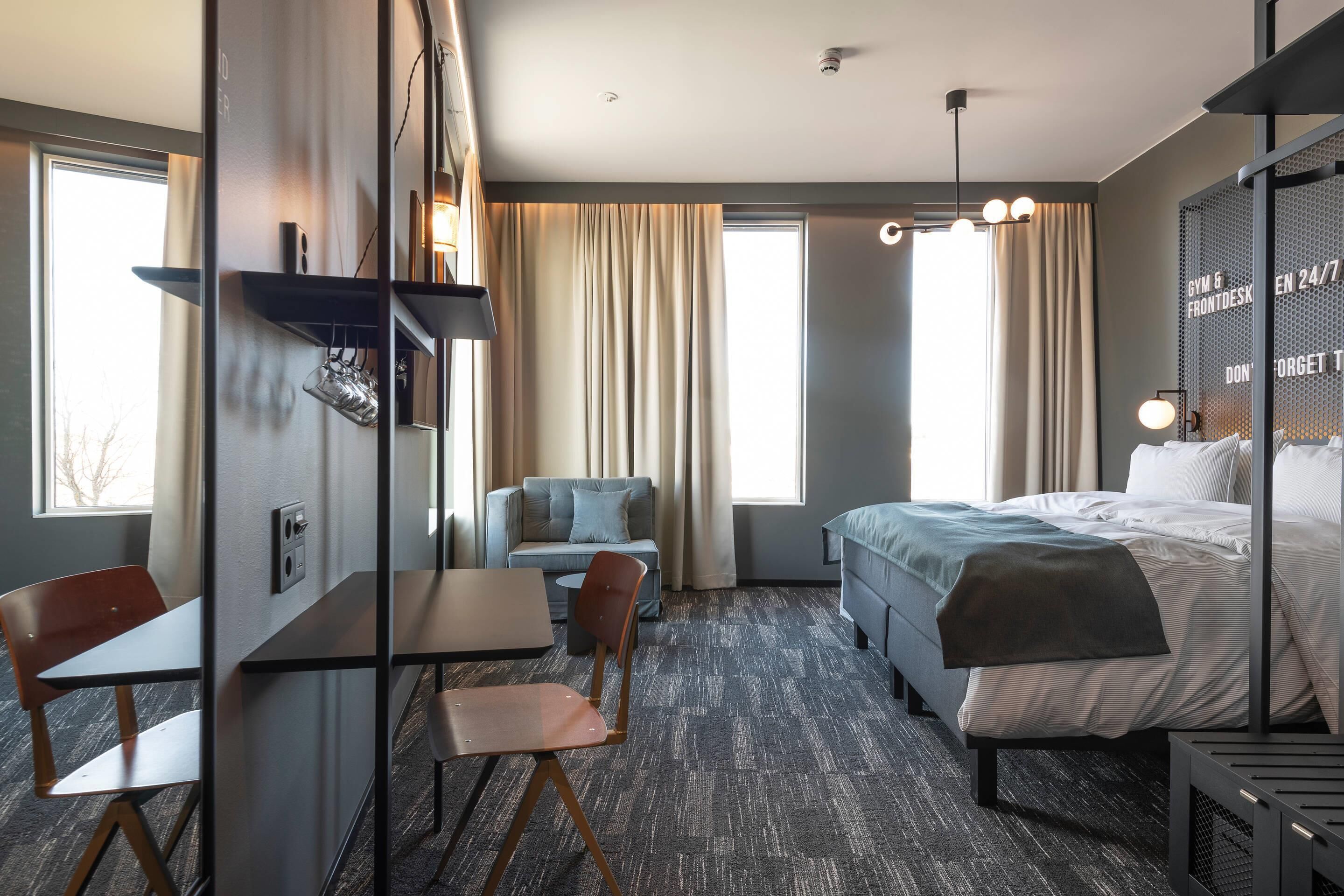 Deluxe Room, 1 King Bed, Non Smoking | In-room safe, desk, soundproofing, iron/ironing board