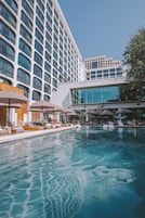 Outdoor pool, a heated pool, open 6:00 AM to 10:00 PM, pool umbrellas