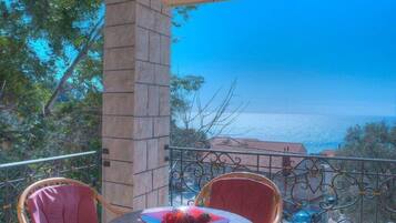 Apartment, 2 Bedrooms, Terrace, Sea View | 1 bedroom, desk, soundproofing, iron/ironing board