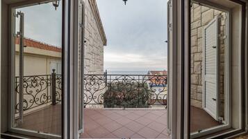 Luxury Apartment, 3 Bedrooms, Sea View | 1 bedroom, desk, soundproofing, iron/ironing board